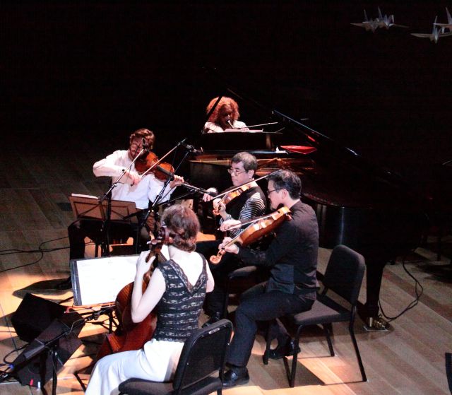 Errollyn Wallen at the piano with the Del Sol String Quartet.