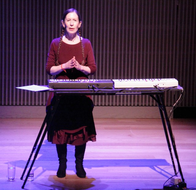 Monk at one of the electronic keyboards